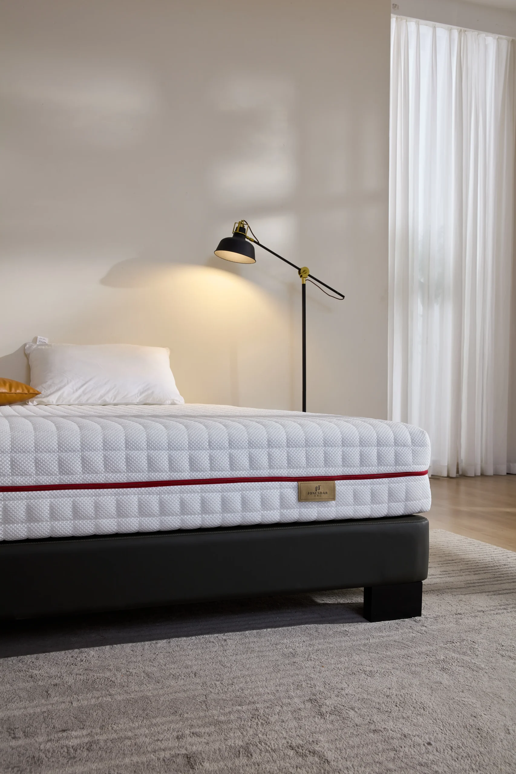 Precision stitching craftsmanship on commercial mattress border